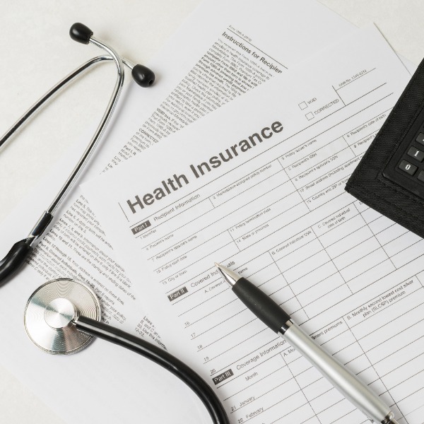 File a claim with your health insurance to cover medical expenses.